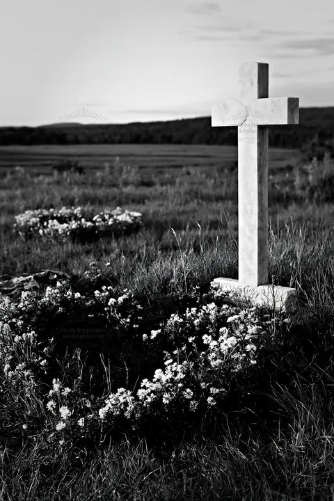 Simple Christian cross in meadow with flowers near sunset - AI-generated stock image