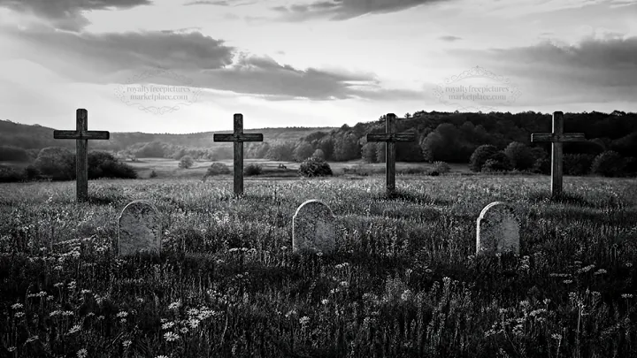 Crosses in meadow with light rays shining through clouds - AI-generated stock image